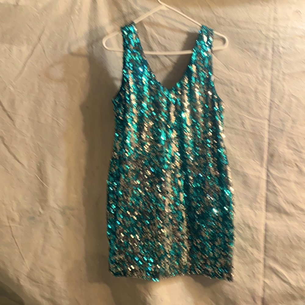 Sexy, sequin dress, worn once, teal and silver, size XL. Always a good time!!!
